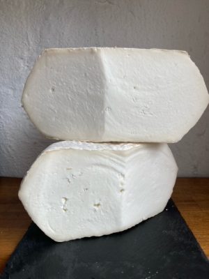 Two chunks of Ticklemore cheese